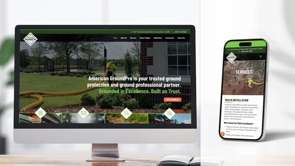 A desktop monitor and smartphone display the American GroundPro website, showcasing landscaping services and company information with green branding on both screens.