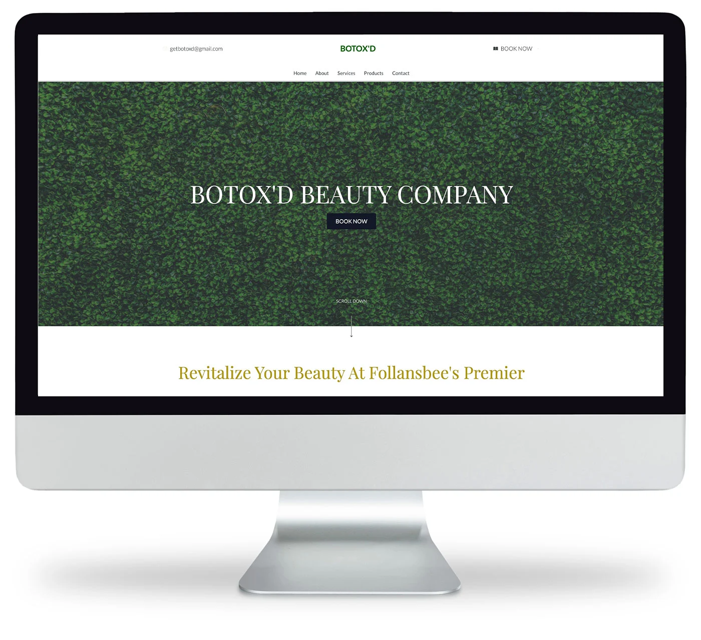 A computer monitor displays a website for Botoxd Beauty Company with a green leafy background and a Book Now button centered on the page.