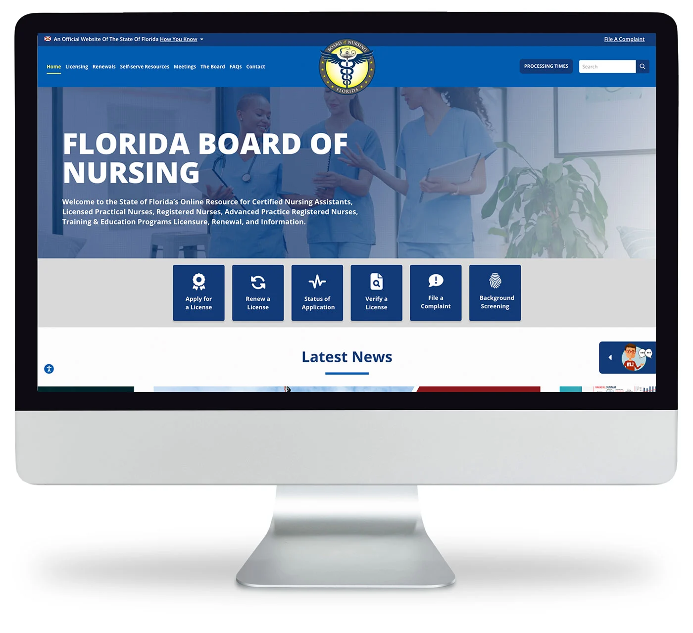 A computer monitor displays the Florida Board of Nursing website homepage, featuring navigation menus, a welcome message, and icons for nursing license resources.