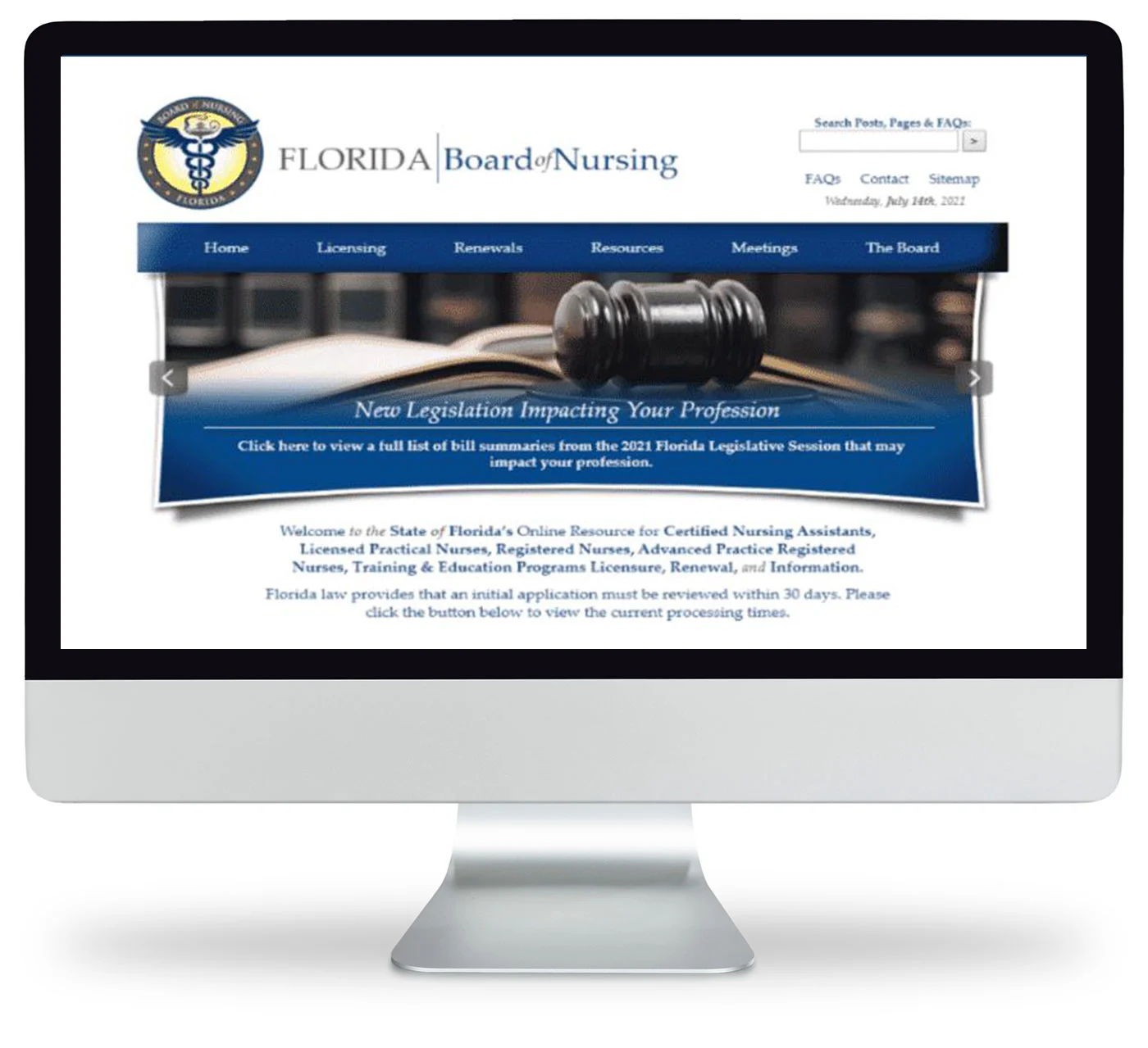 A computer monitor displays the Florida Board of Nursing website homepage, featuring navigation menus, a gavel image, and a highlighted section about new legislation impacting nursing professionals.